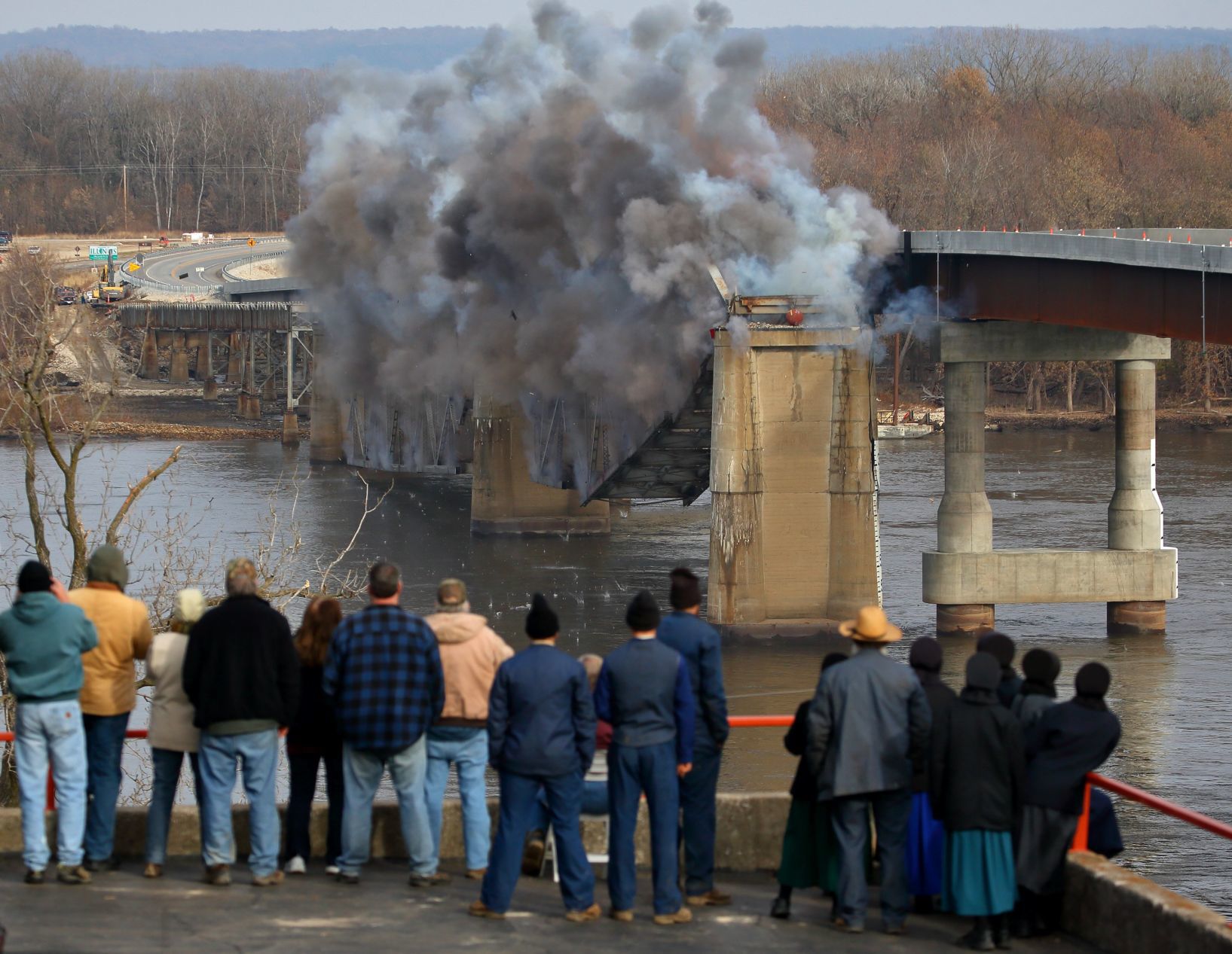 Final section of old Champ Clark Bridge demolished